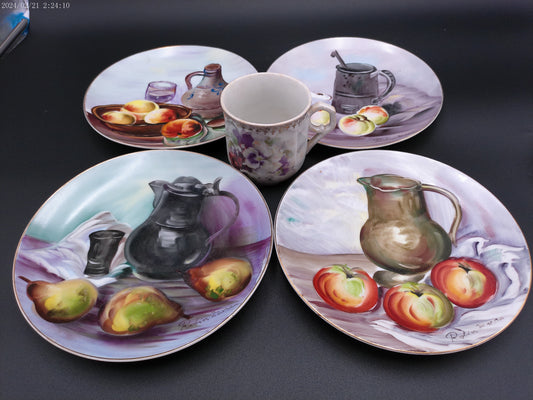 Handpainted ceramic plates 4  by Robin Mara and a Cup