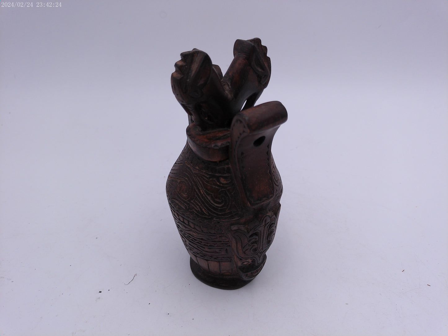 Very Old container has a detailed carved design all around, it has two handles and top lid.