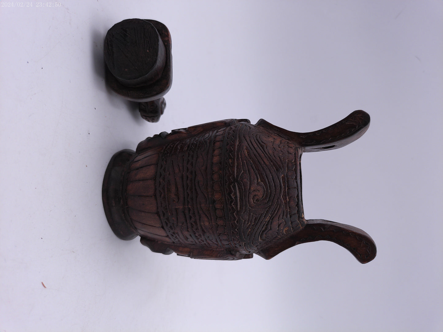 Very Old container has a detailed carved design all around, it has two handles and top lid.