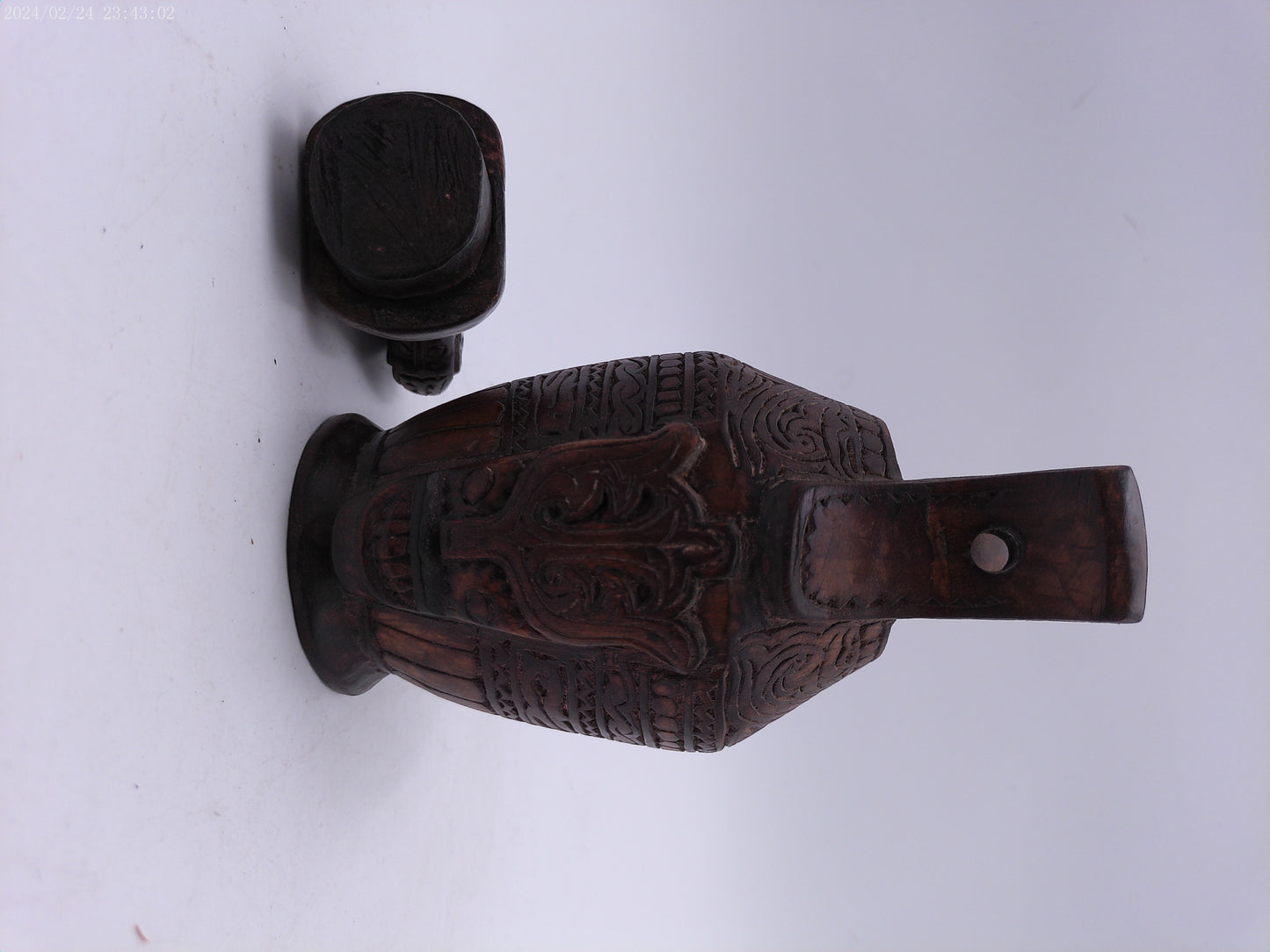 Very Old container has a detailed carved design all around, it has two handles and top lid.