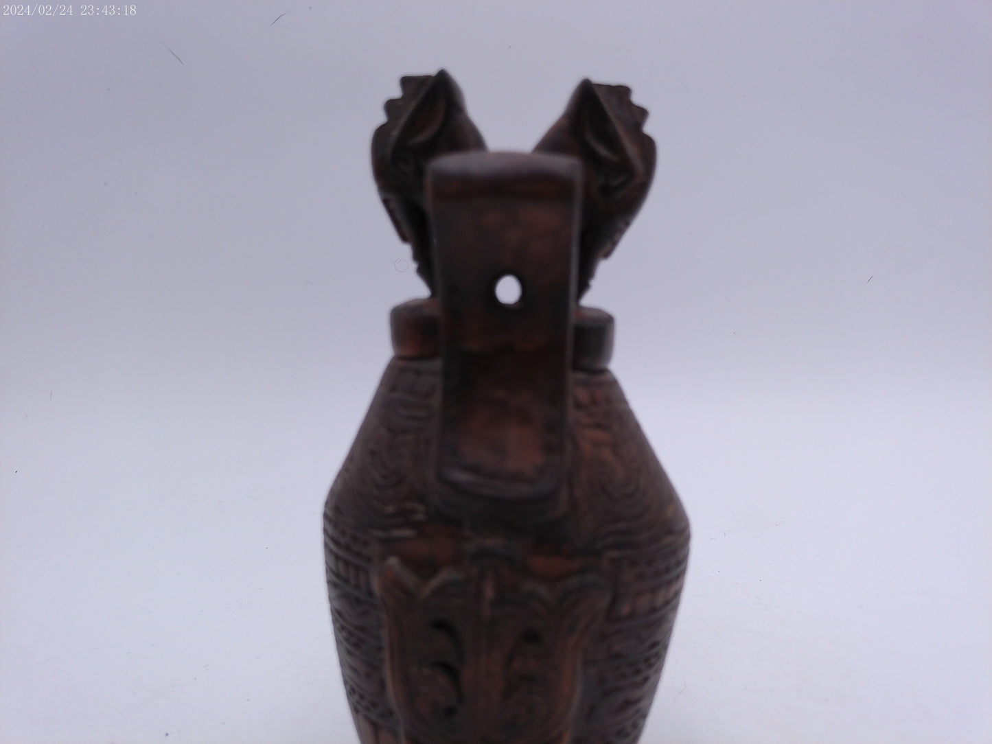Very Old container has a detailed carved design all around, it has two handles and top lid.