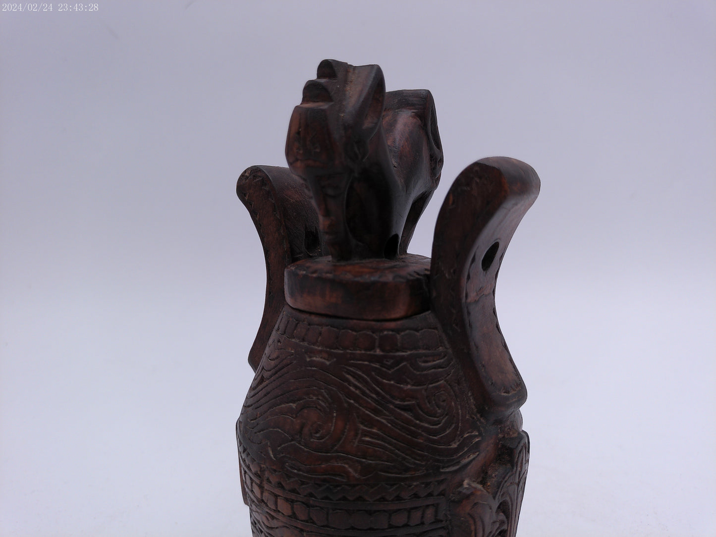 Very Old container has a detailed carved design all around, it has two handles and top lid.