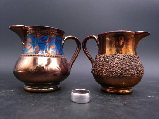 Small Copper Luster Creamer 3" Tall and Copper Lustre Cream Pitcher with Blue Decor on it