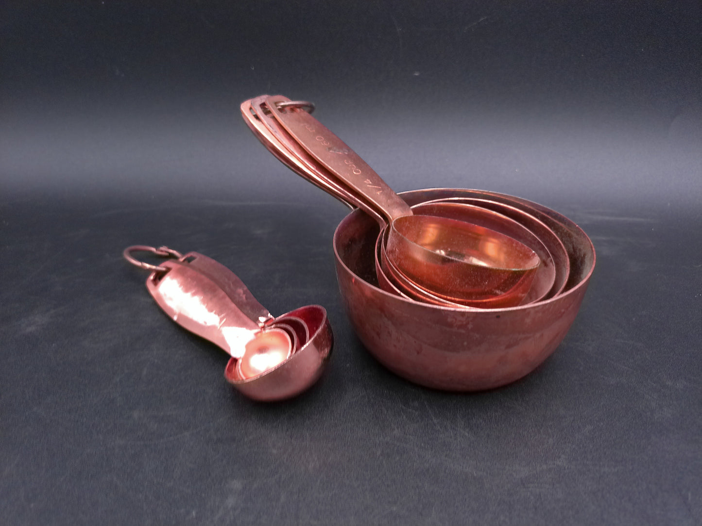 Hammered Copper 8 Piece Measuring Cup Set with Hand Engraved Measurements