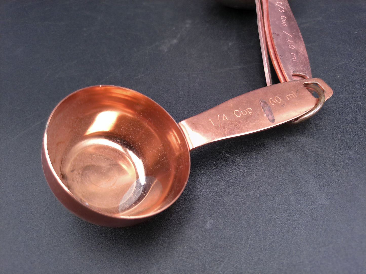 Hammered Copper 8 Piece Measuring Cup Set with Hand Engraved Measurements