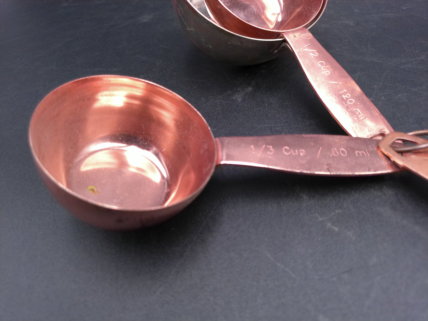 Hammered Copper 8 Piece Measuring Cup Set with Hand Engraved Measurements