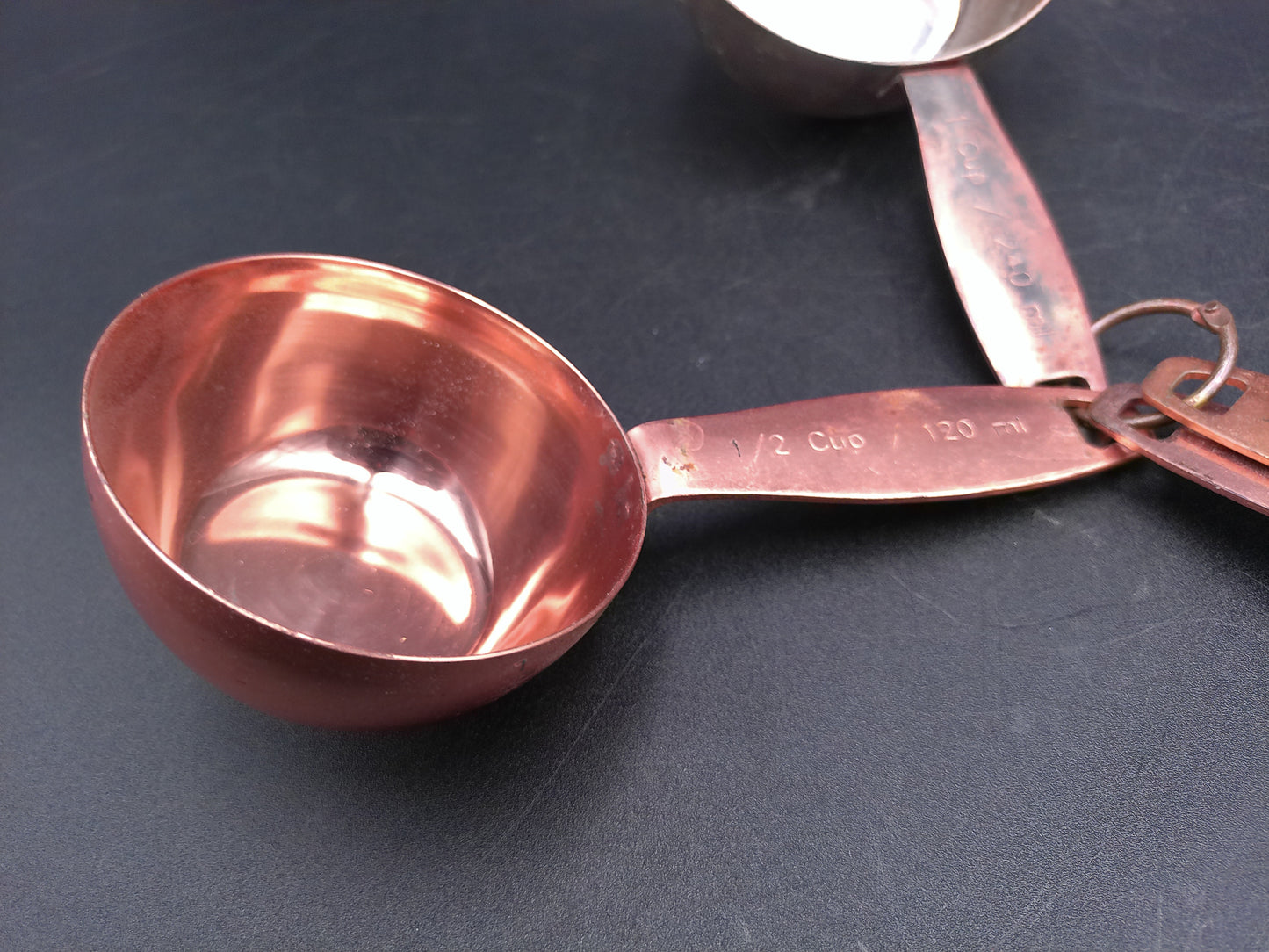 Hammered Copper 8 Piece Measuring Cup Set with Hand Engraved Measurements