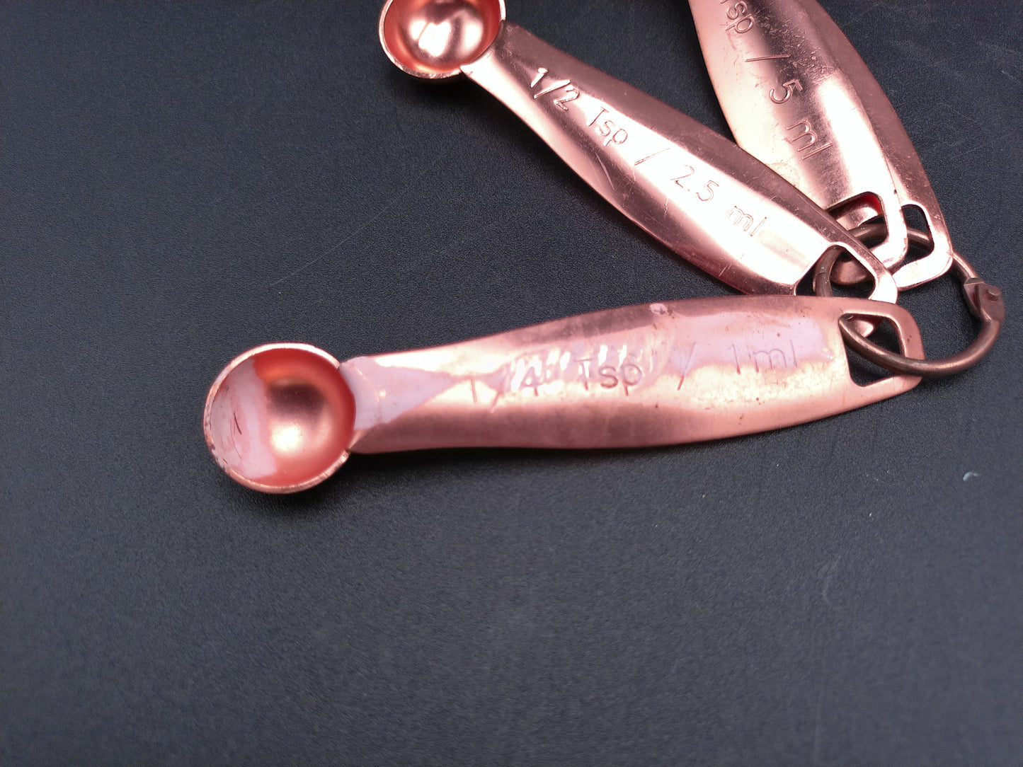 Hammered Copper 8 Piece Measuring Cup Set with Hand Engraved Measurements