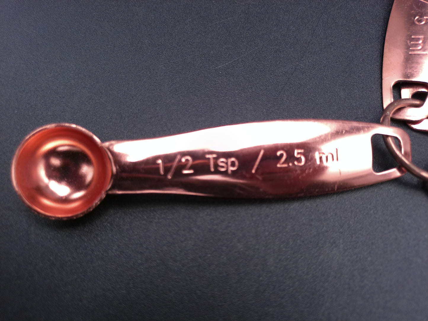 Hammered Copper 8 Piece Measuring Cup Set with Hand Engraved Measurements