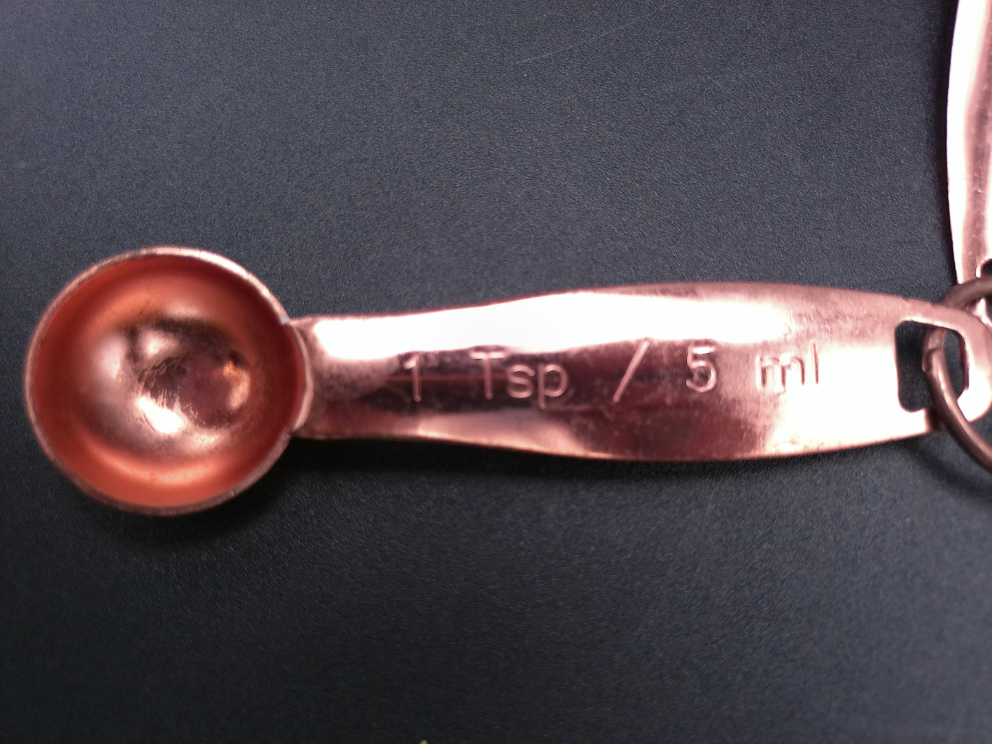 Hammered Copper 8 Piece Measuring Cup Set with Hand Engraved Measurements