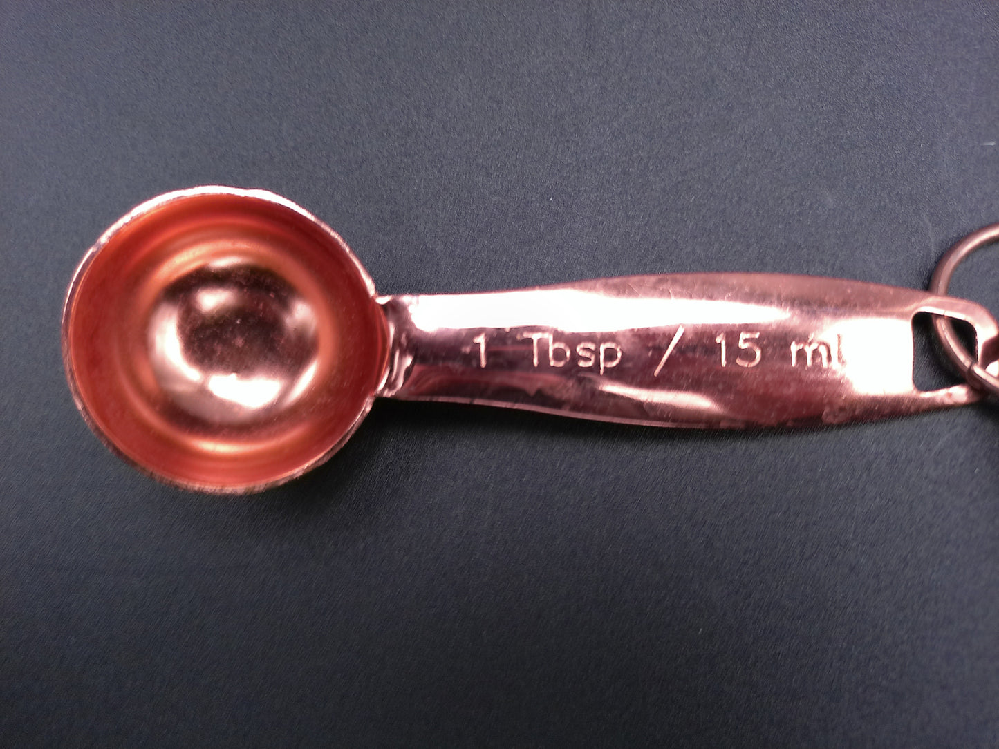 Hammered Copper 8 Piece Measuring Cup Set with Hand Engraved Measurements