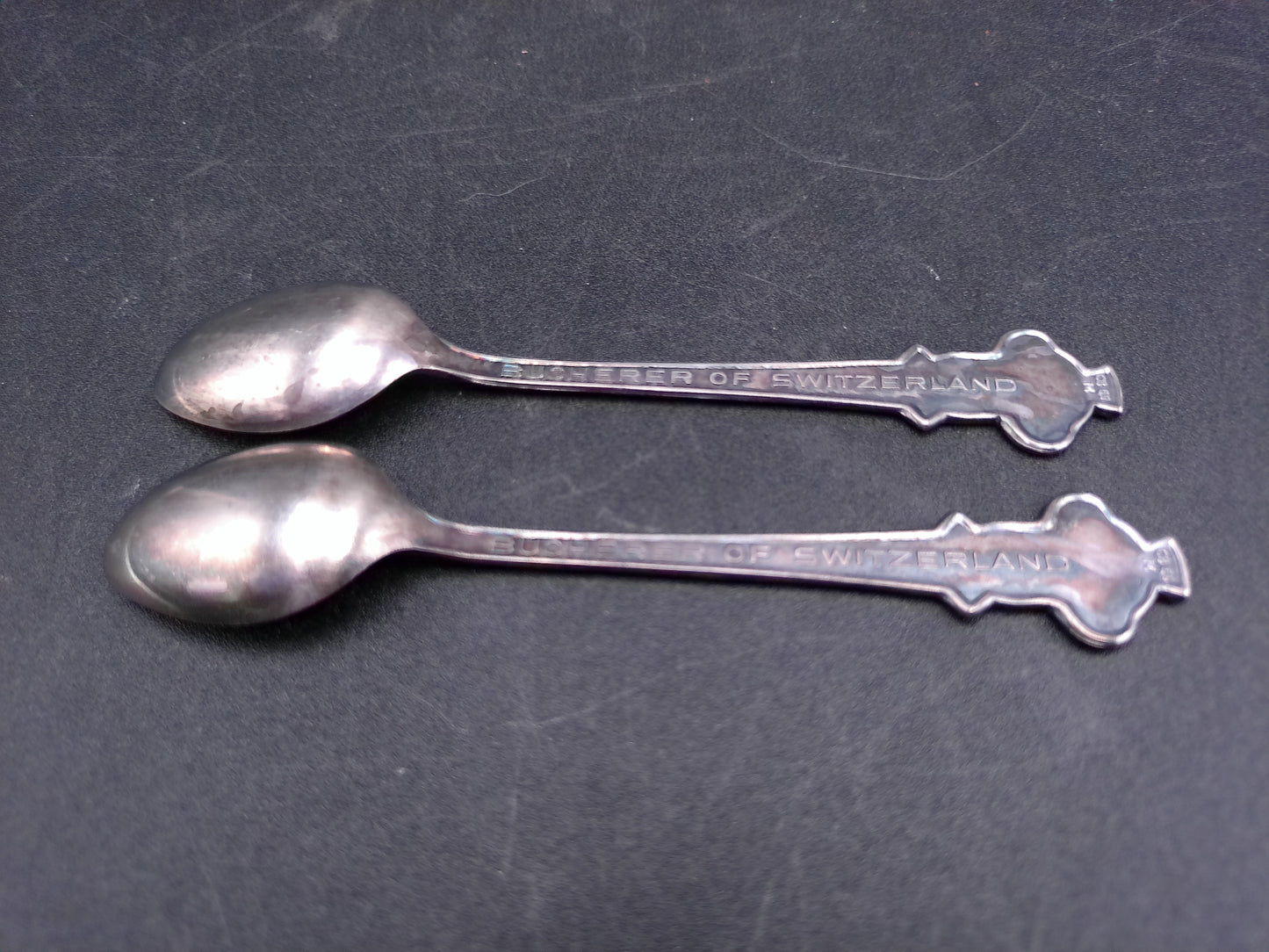 Rolex Set of 2 Spoons Bucherer Geneve with City Graphic