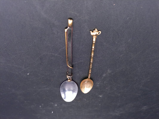Set of 2 Spoons  Gold Colored with Tea Pot on one and other Wrapped in Gold Wire