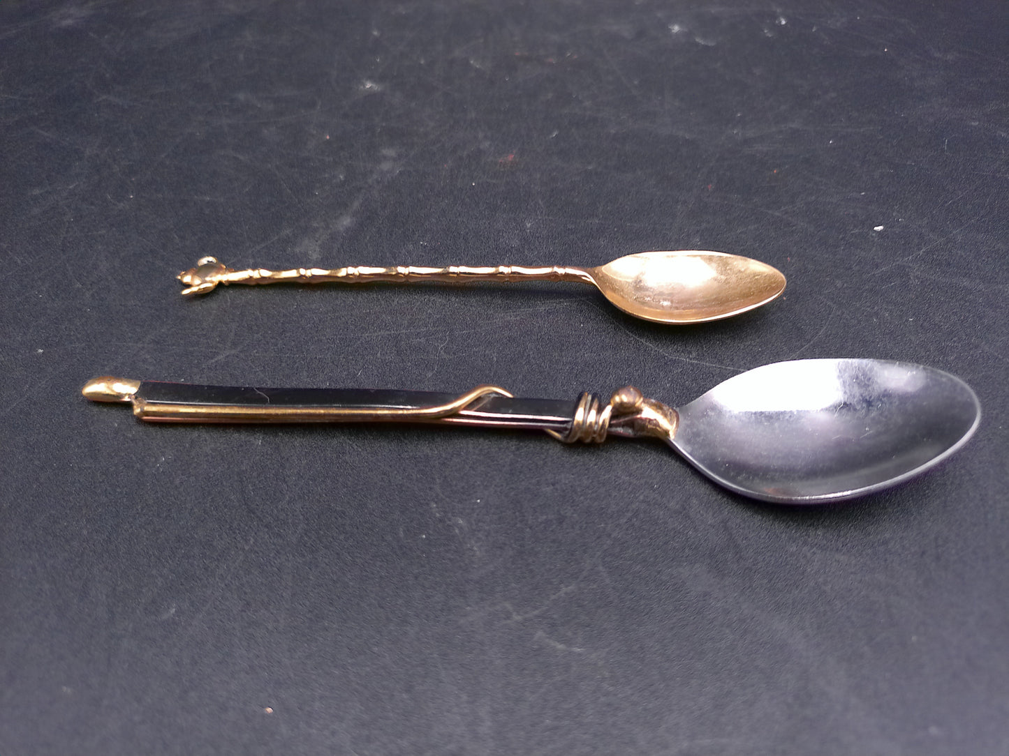 Set of 2 Spoons Gold Colored with Tea Pot on one and other Wrapped in Gold Wire