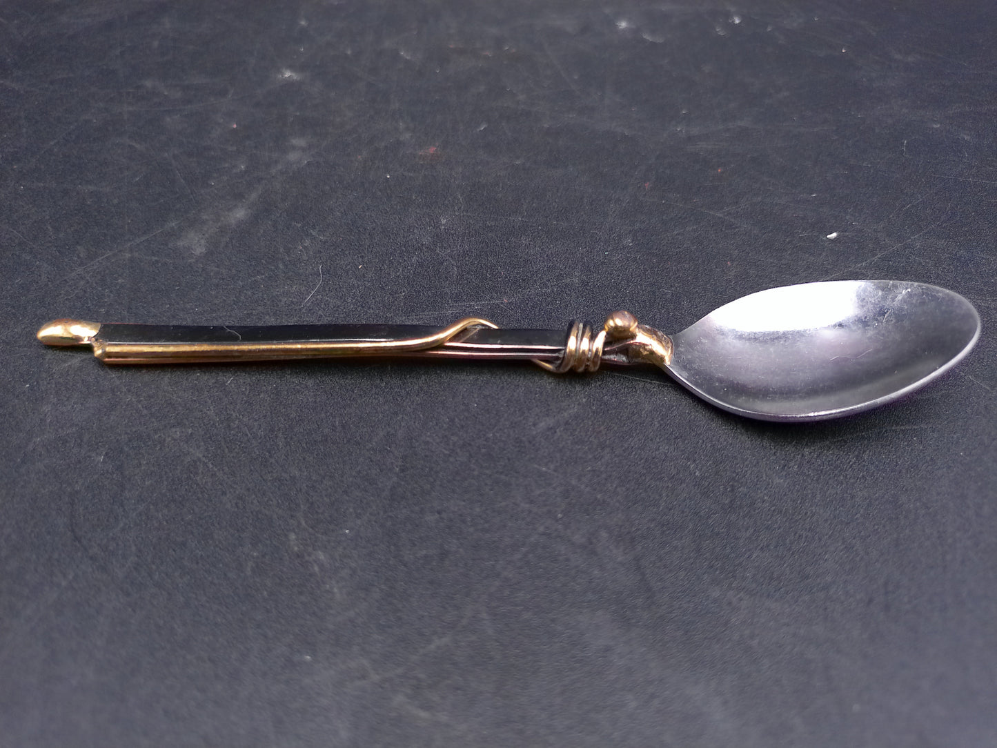 Set of 2 Spoons Gold Colored with Tea Pot on one and other Wrapped in Gold Wire