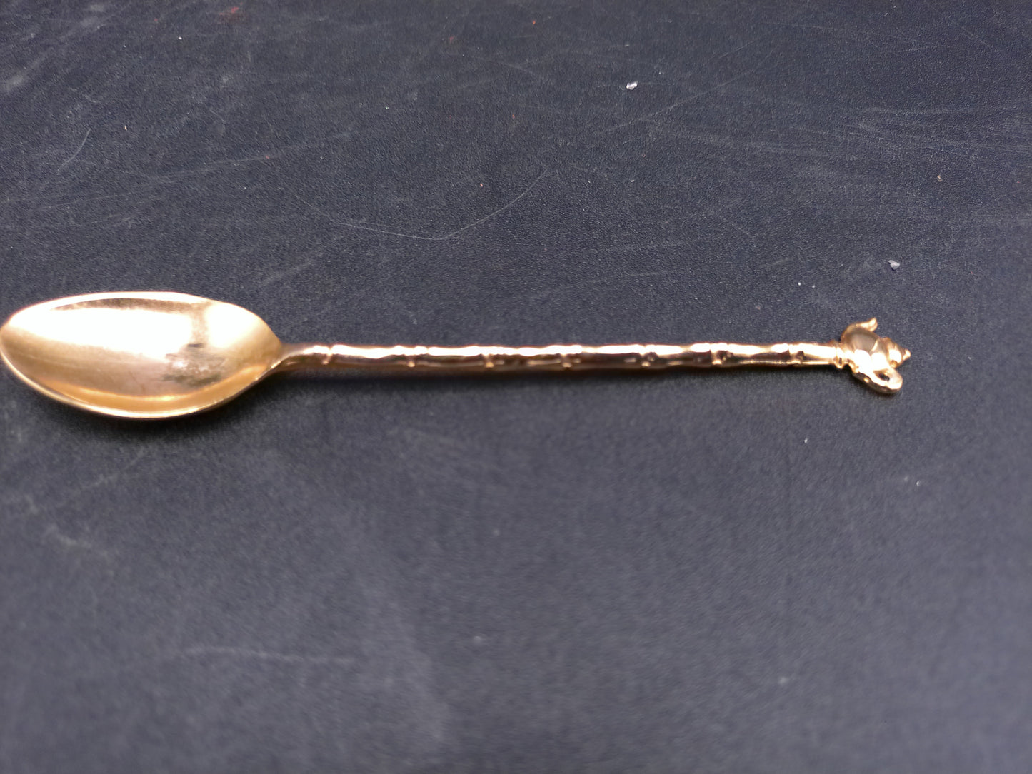 Set of 2 Spoons Gold Colored with Tea Pot on one and other Wrapped in Gold Wire