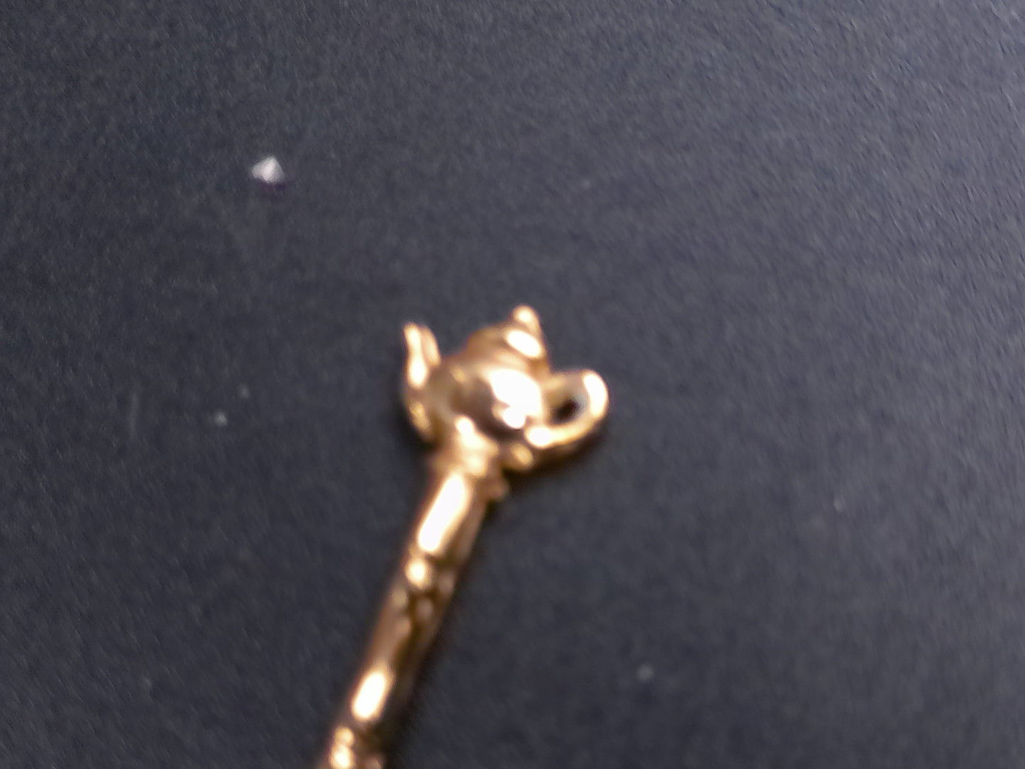 Set of 2 Spoons Gold Colored with Tea Pot on one and other Wrapped in Gold Wire