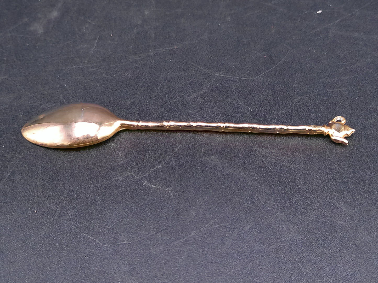 Set of 2 Spoons Gold Colored with Tea Pot on one and other Wrapped in Gold Wire