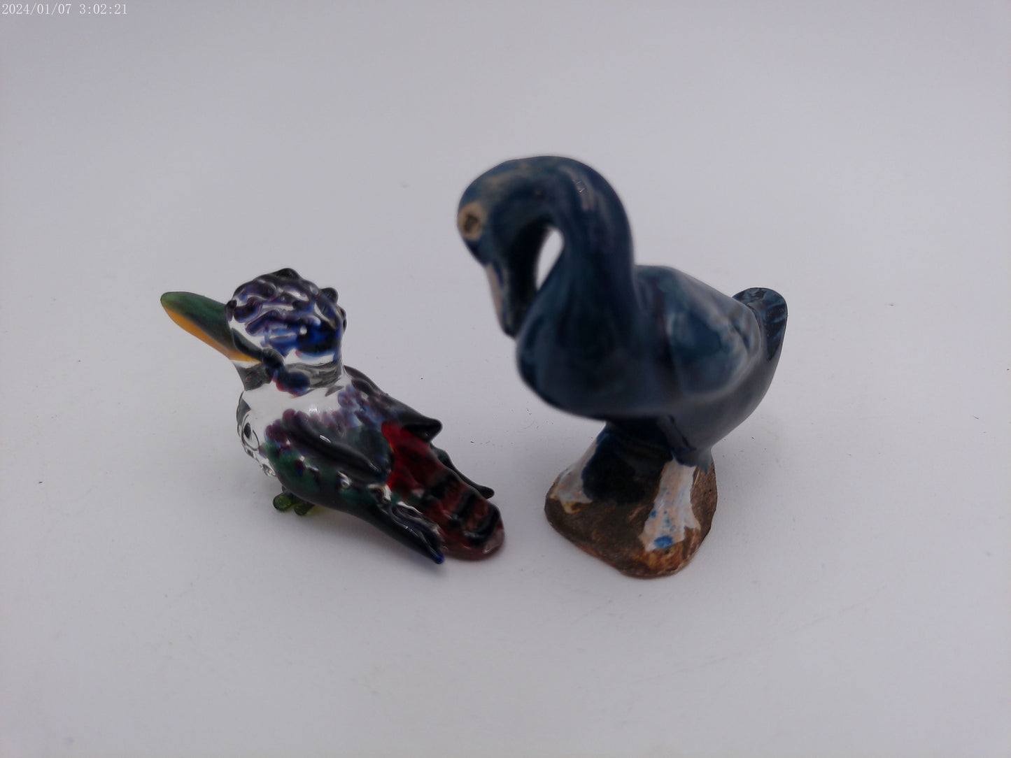 Two Ducks one glass one Ceramic