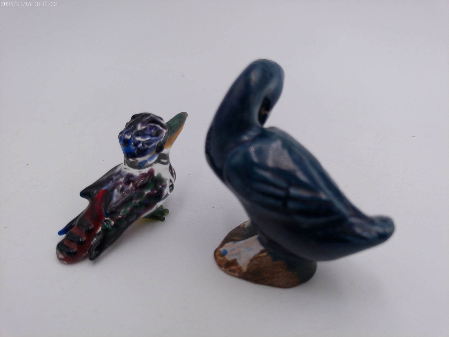 Two Ducks one glass one Ceramic