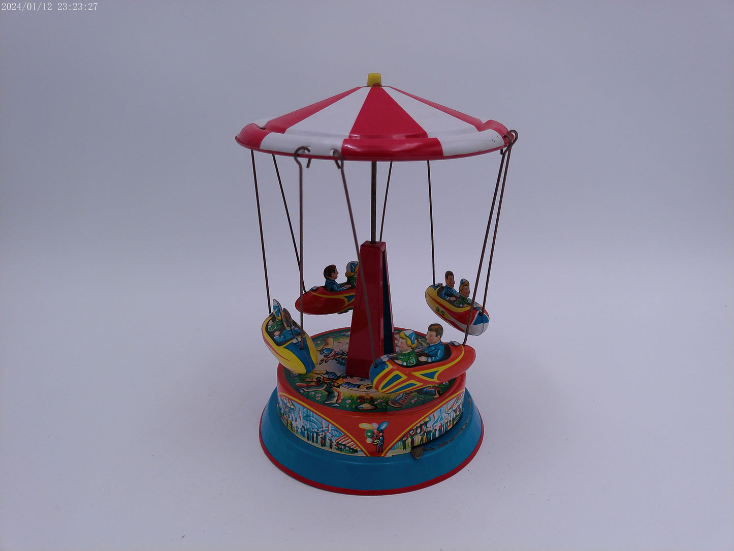 Mechanical Merry Go Round  Roundabout with Gondolas Tin Toy Spins