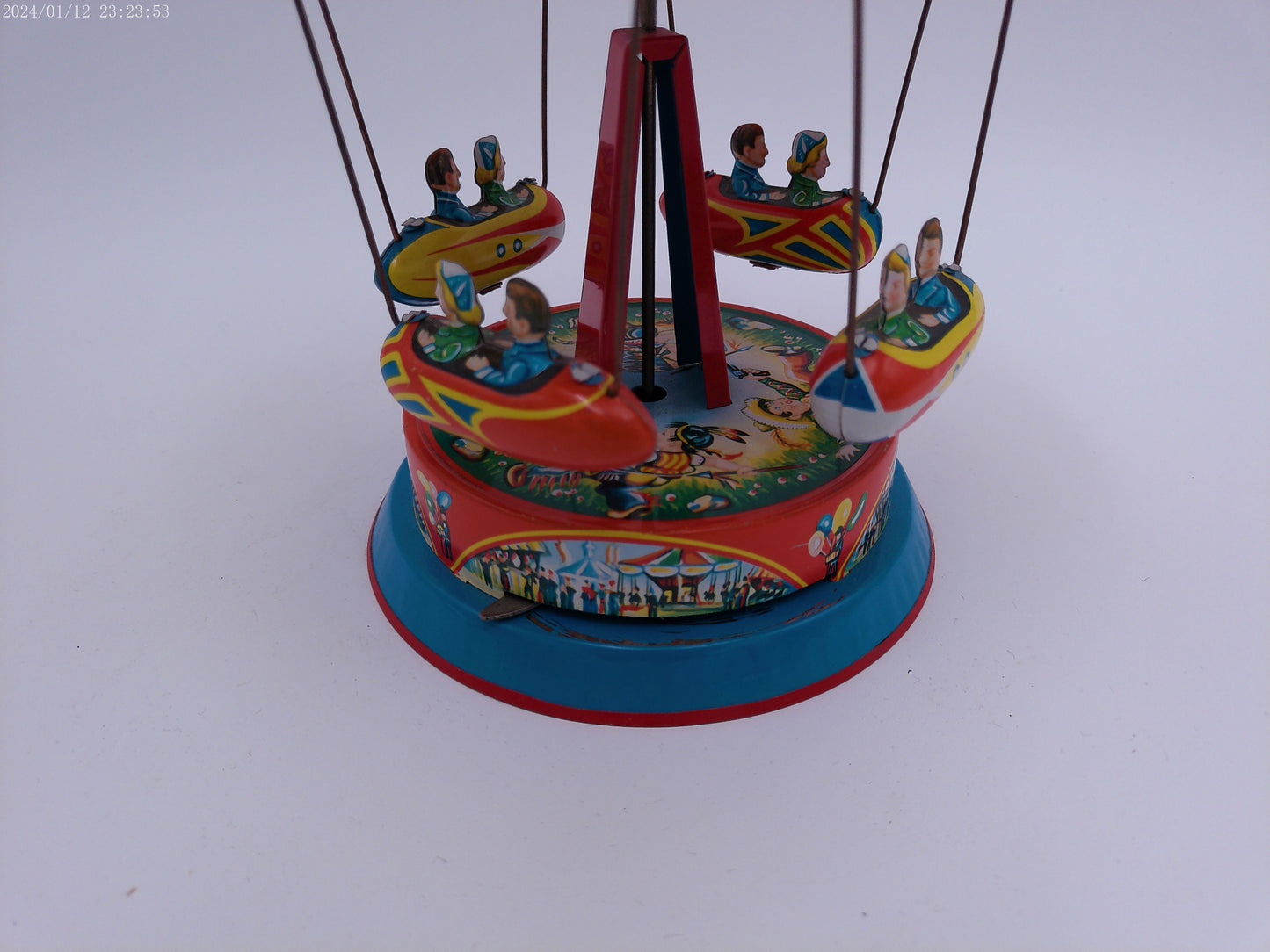 Mechanical Merry Go Round  Roundabout with Gondolas Tin Toy Spins