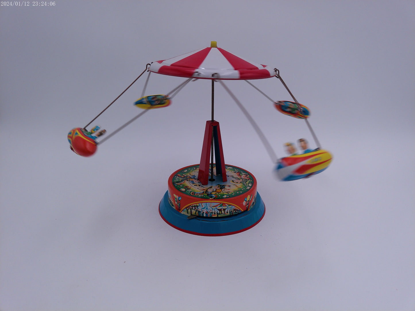 Mechanical Merry Go Round  Roundabout with Gondolas Tin Toy Spins