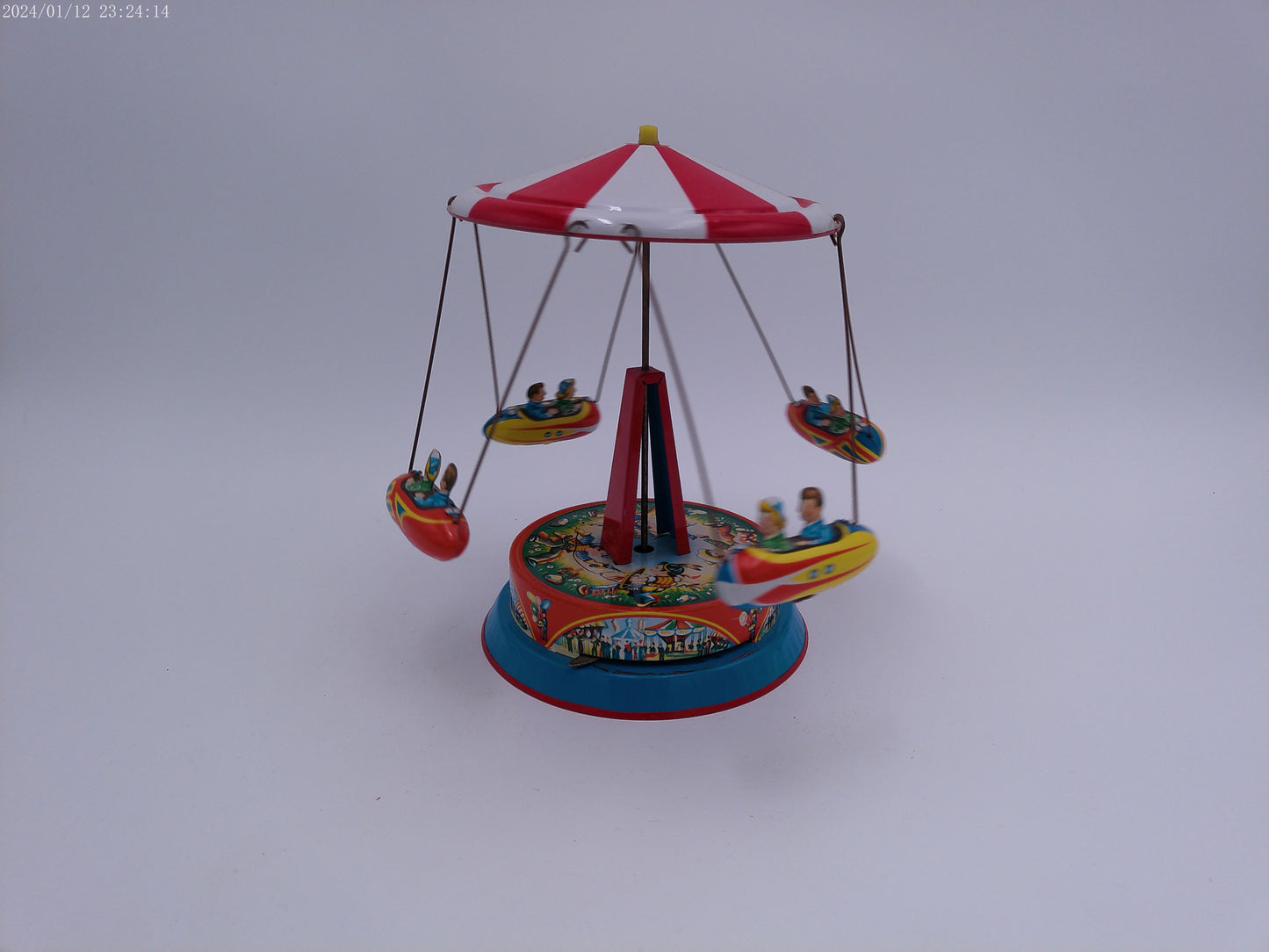 Mechanical Merry Go Round  Roundabout with Gondolas Tin Toy Spins