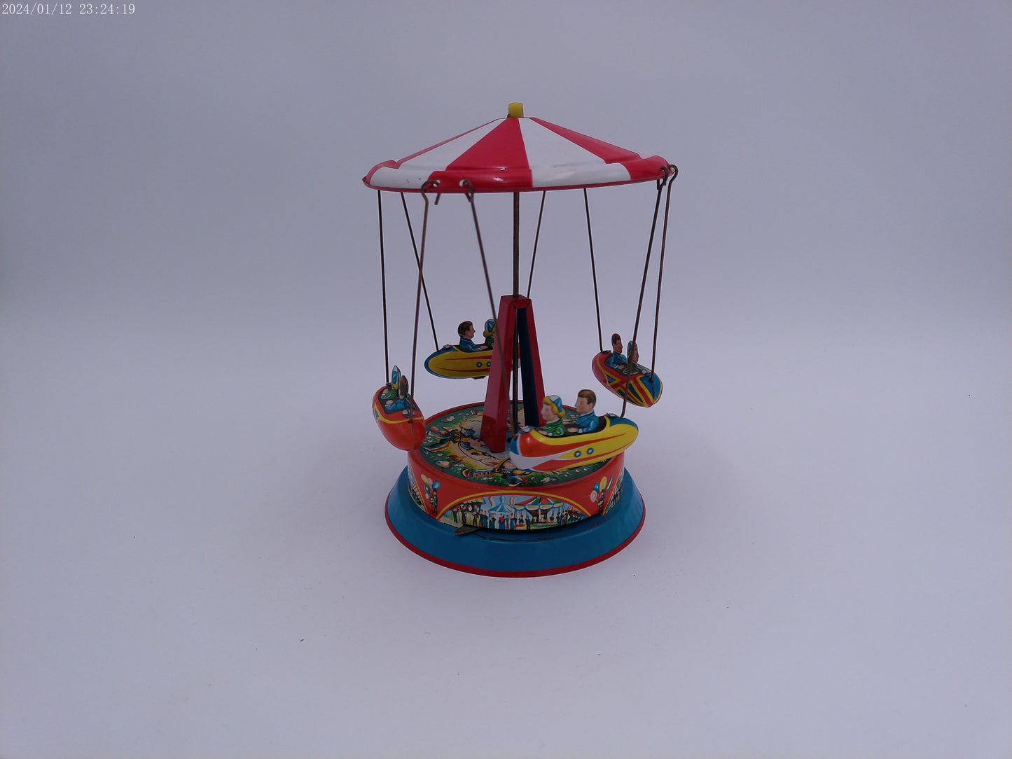 Mechanical Merry Go Round  Roundabout with Gondolas Tin Toy Spins