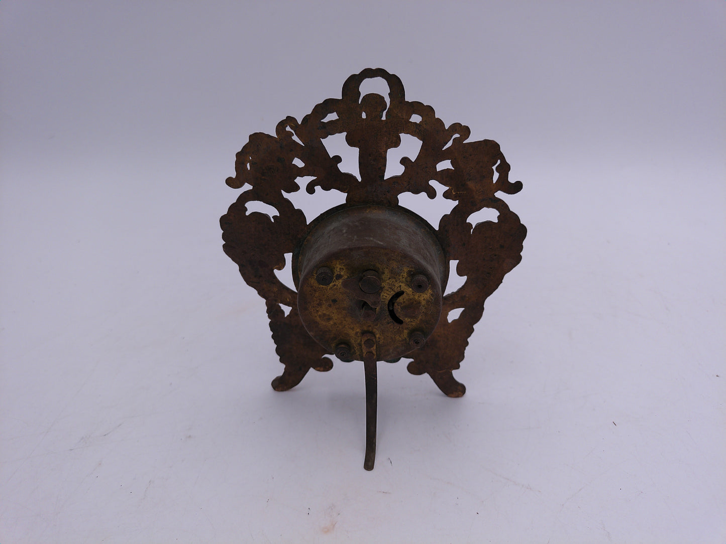 New Haven Clock with Brass Stand and Angels Antique