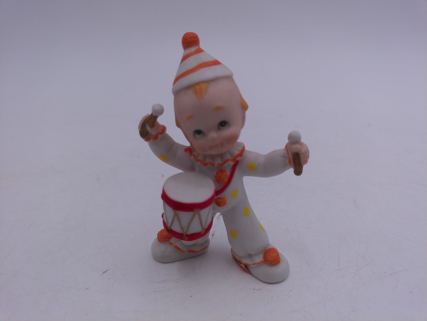 Kewpie  and other Figurines  lot of 8  and a Bell