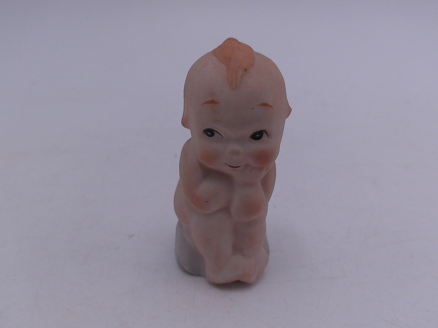 Kewpie  and other Figurines  lot of 8  and a Bell