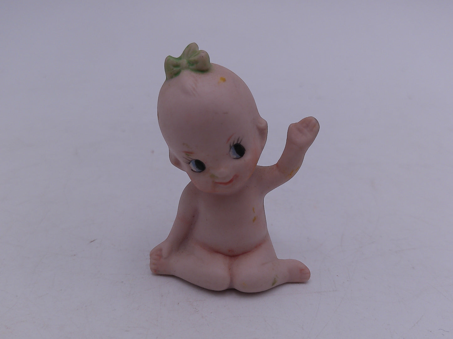 Kewpie  and other Figurines  lot of 8  and a Bell