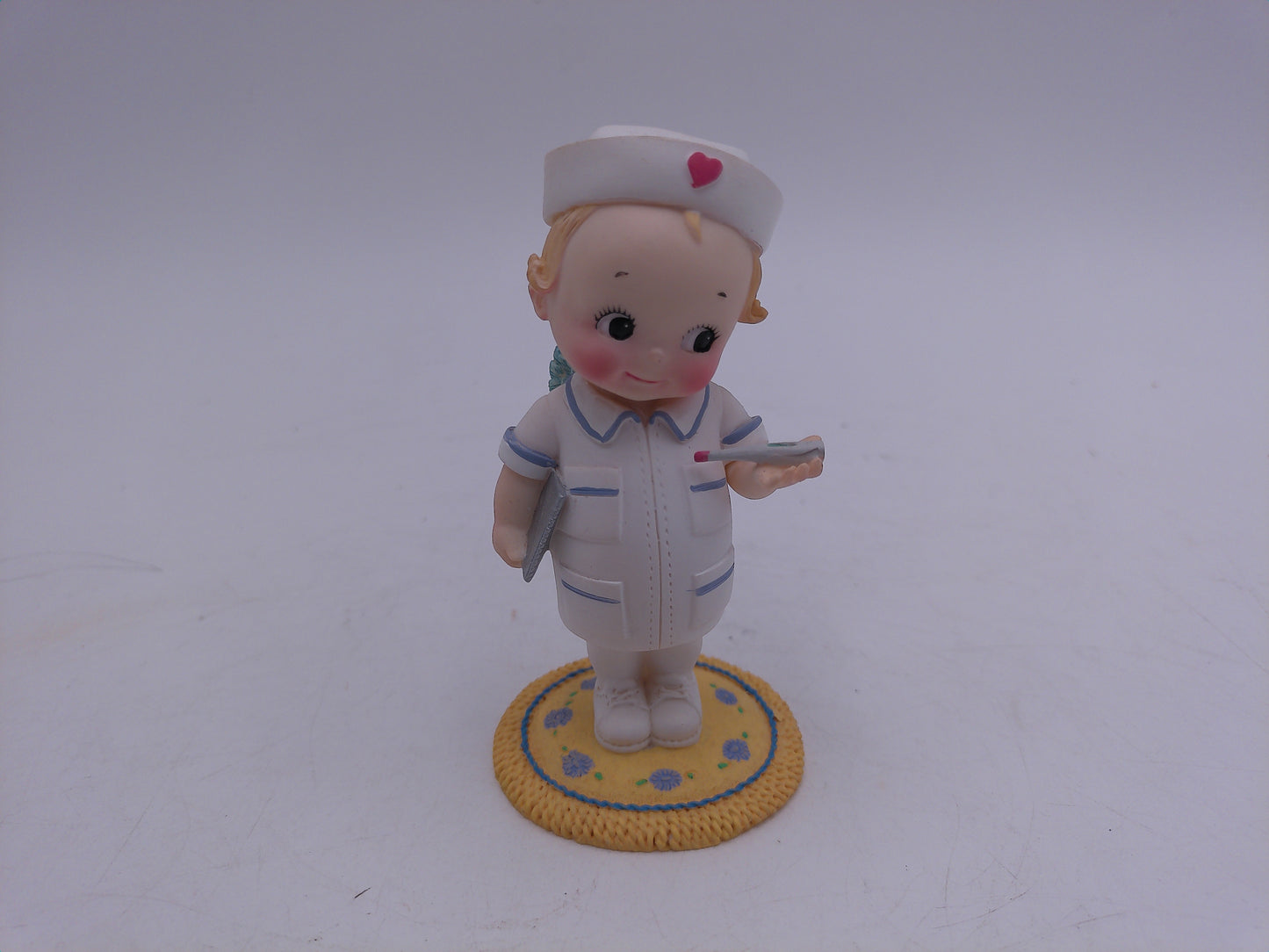 Kewpie lot of 6 Nurse Graduation Angel Noel Kewpie in Shoe and Fishing Vintage