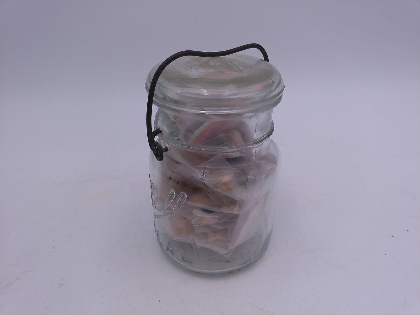 Kewpie Valentine figures with heart message in Jar