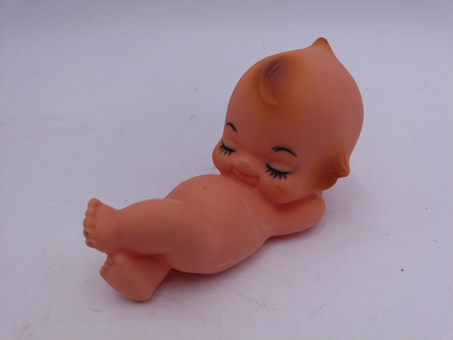 Kewpie Dolls Lot pf 3 one imight be powder dispenser and one on Blanket Vintage