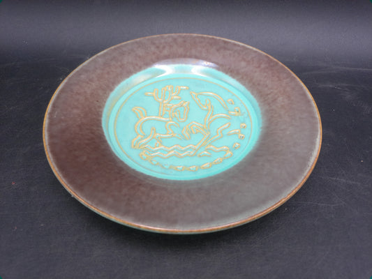 Plate from the United States Ceramic Tile Company. The plate Roman Horse Design