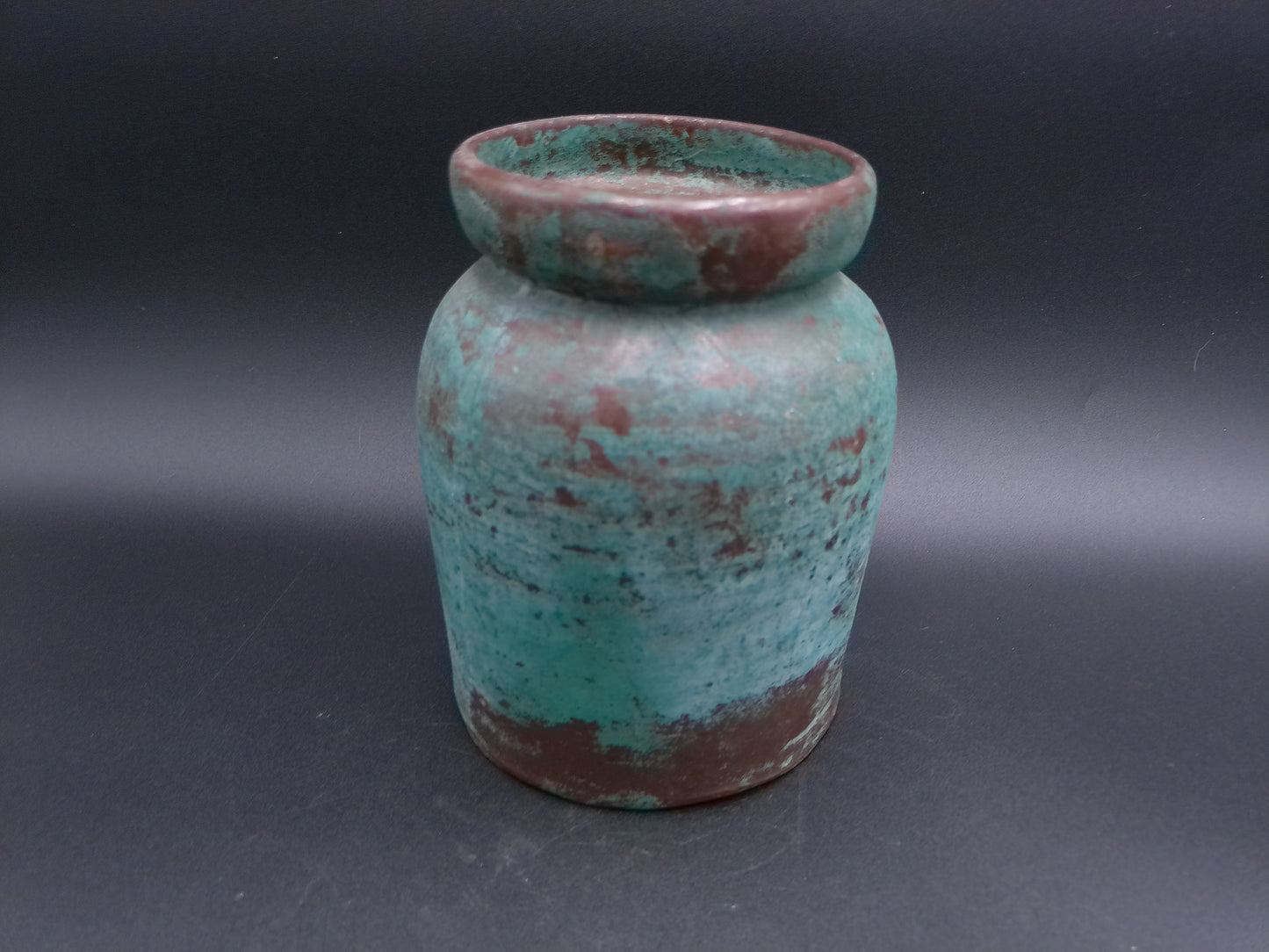 Vase  Early 20th century Chinese ceramic vase. This antique farmhouse style ceramic jar has a beautifully aged emerald green glazed finish