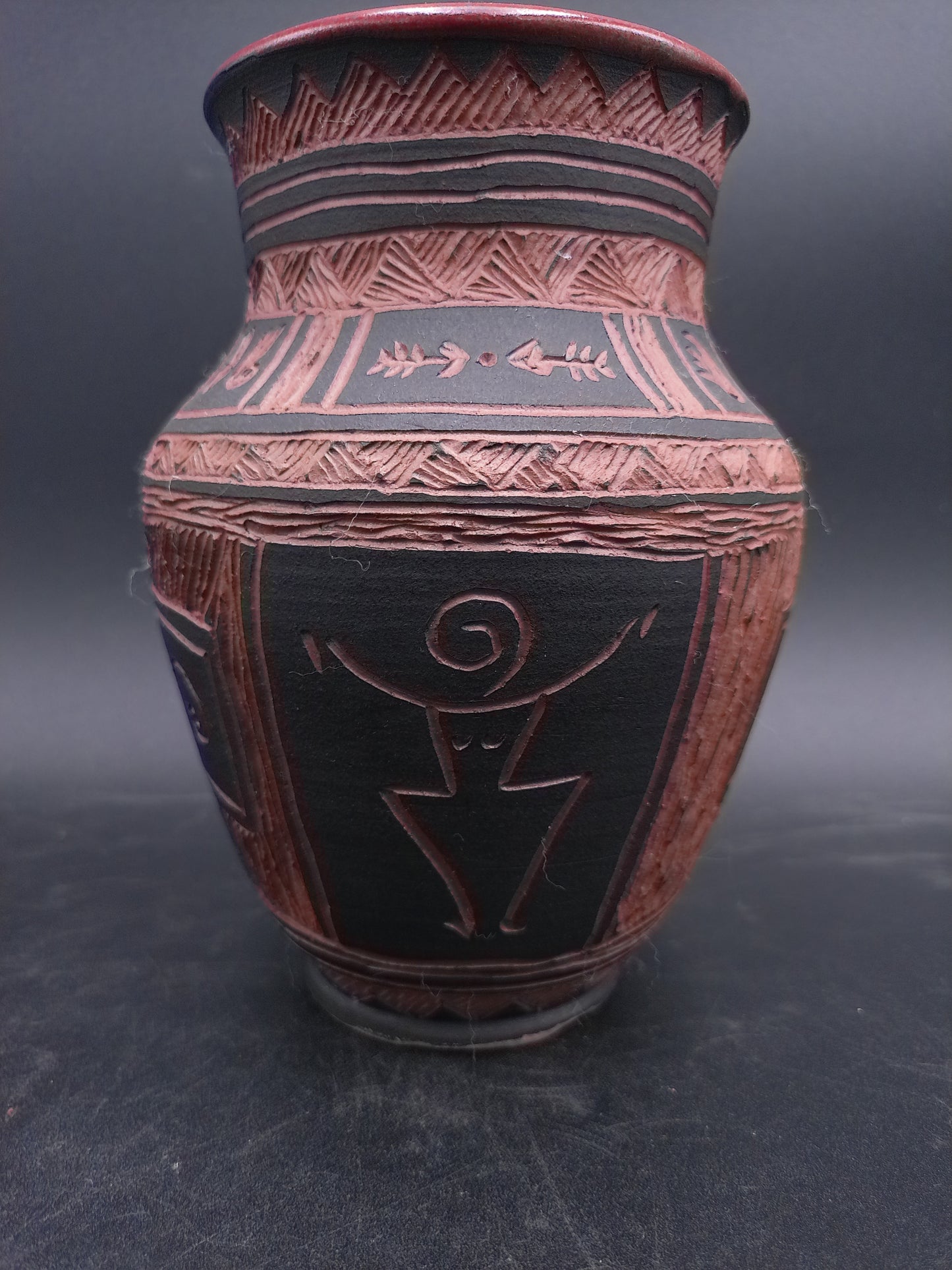 Clay Vase is a stunning piece of art. Handcrafted and signed by Eleanor HalwoodArtist Carolyn Adkisson