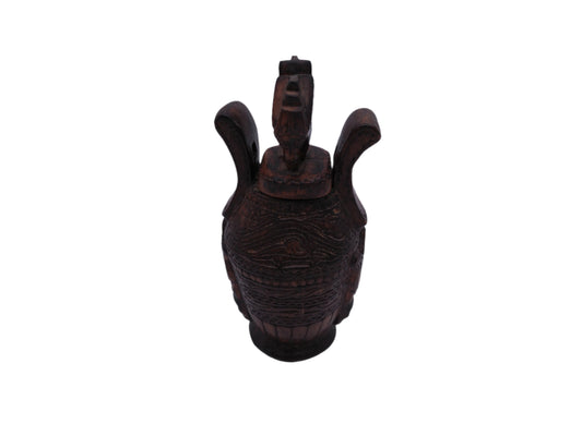 Very Old container has a detailed carved design all around, it has two handles and top lid.