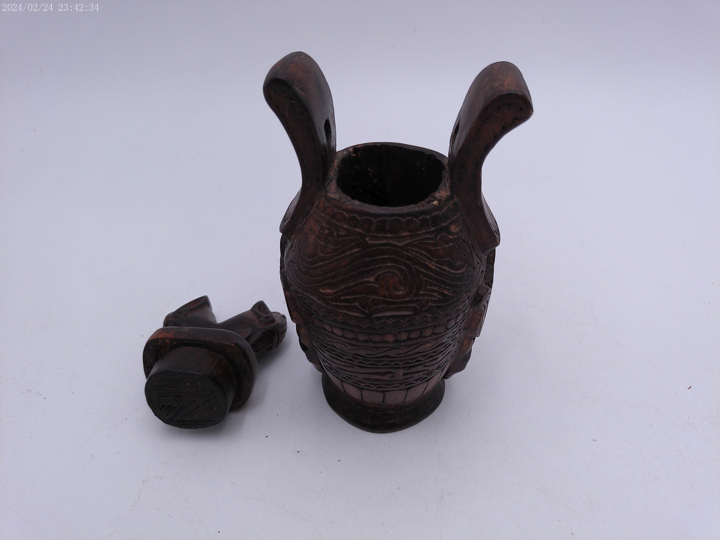 Very Old container has a detailed carved design all around, it has two handles and top lid.