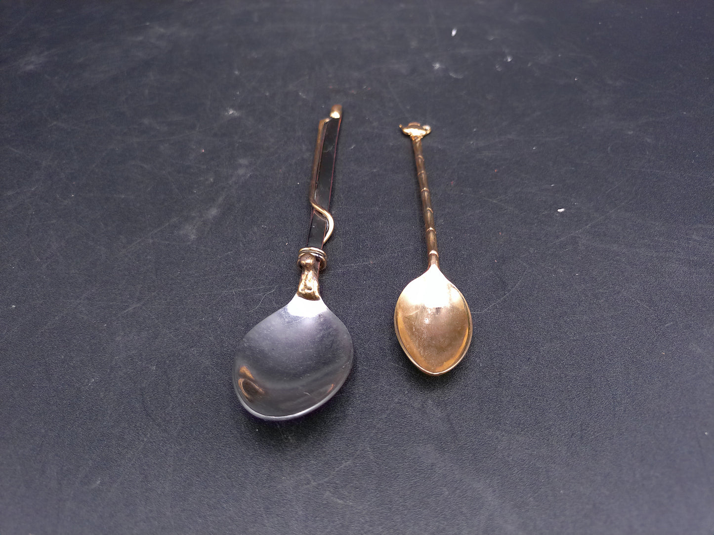 Set of 2 Spoons  Gold Colored with Tea Pot on one and other Wrapped in Gold Wire